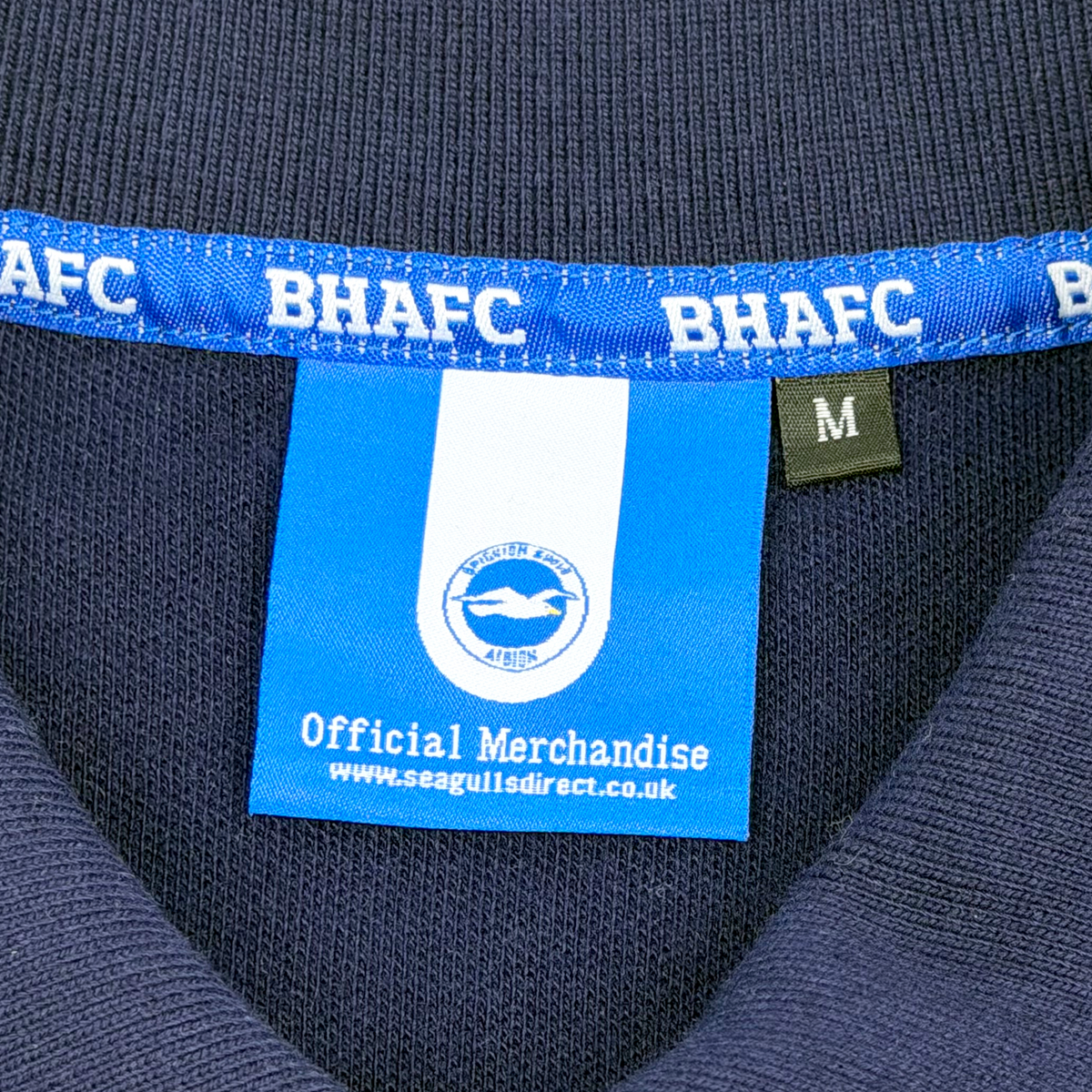 Brighton & Hove Albion Navy Striped Polo Shirt | Medium